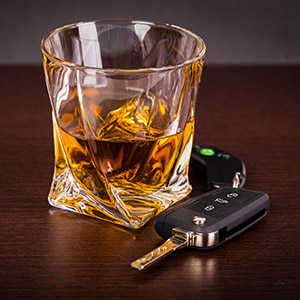 Car keys and alcoholic drink